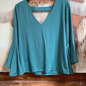 Crop length too long trumpet sleeve open back